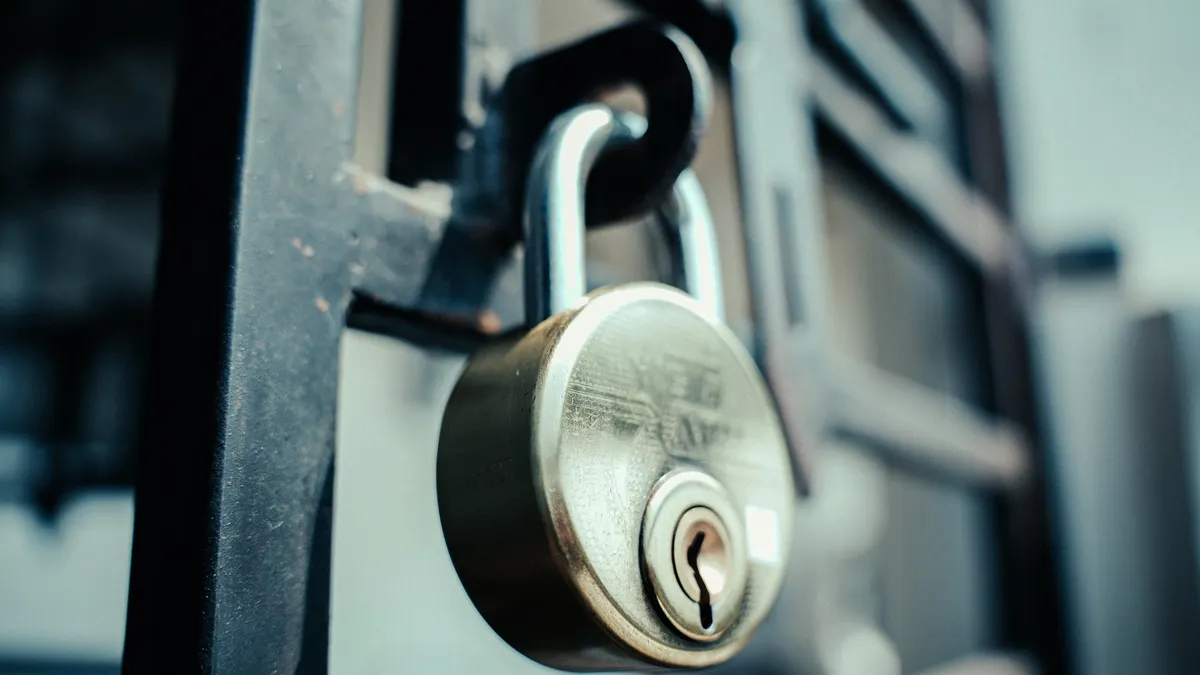close-up padlock on a gate
